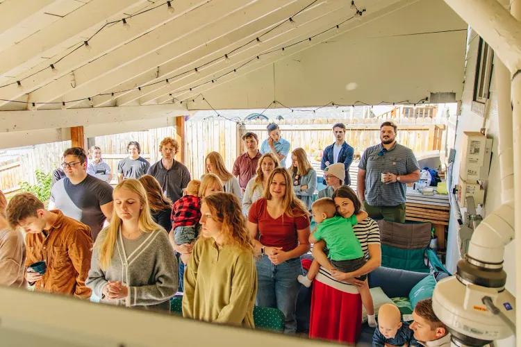 The congregation praying during a worship service